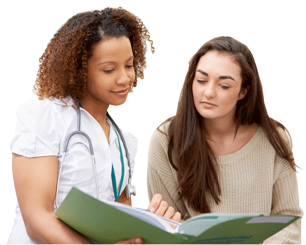NHS nurse reading document to young lady