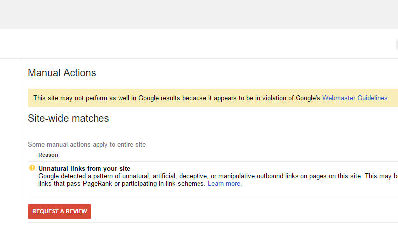 A manual action issues in Search Console for unnatural outbound links.