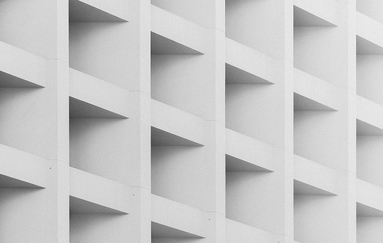 A close-up shot of a white cubby shelf